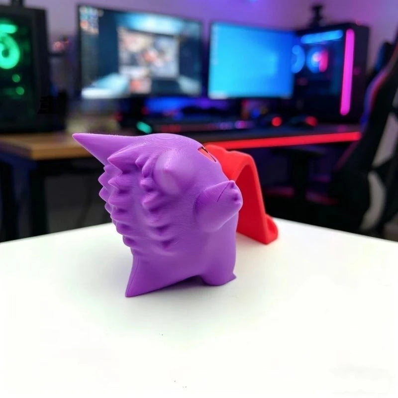 Soporte figura fantasma para mando y móvil